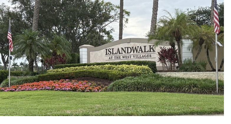 IslandWalk at the West Villages entrance sign and palms in Venice, Florida